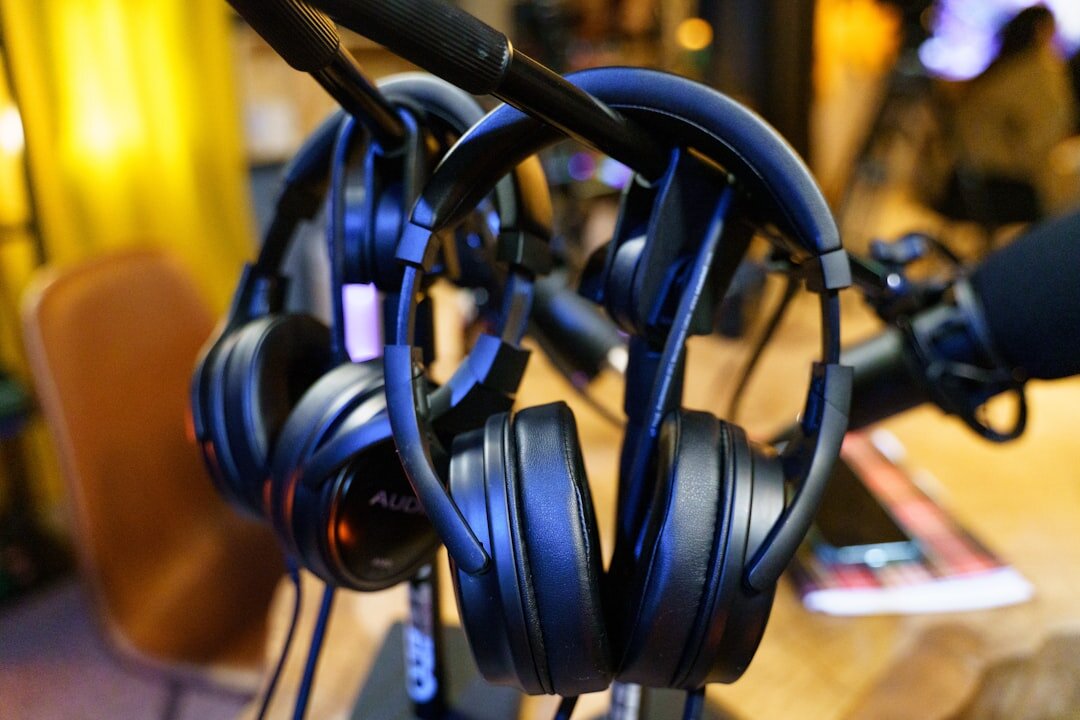 Podcast recording session with microphone and headphones in studio