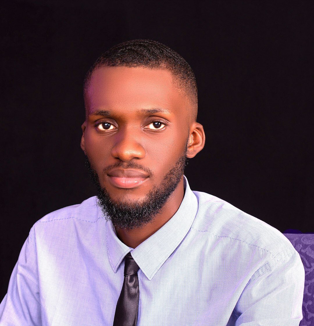 Professional headshot of male media director