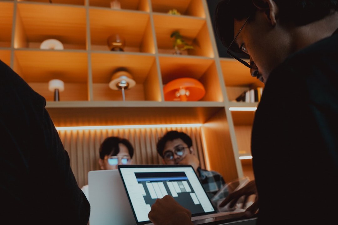 Media professionals collaborating in a modern creative workspace